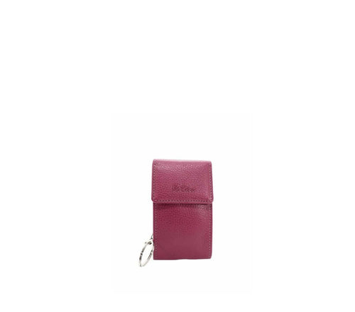 Clé en cuir rose avec porte-cartes intégré, épurée et élégante.