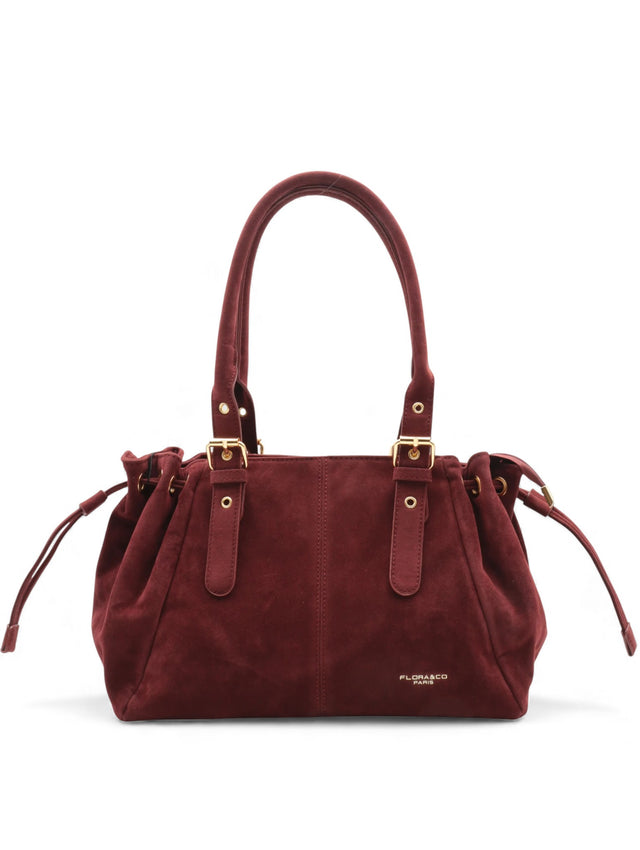 Sac à main en suède rouge avec poignées et détails en cuir noir, élégant et pratique pour toutes occasions.
