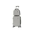 Valise et sac de voyage en aluminium gris à roulettes, élégance et praticité.