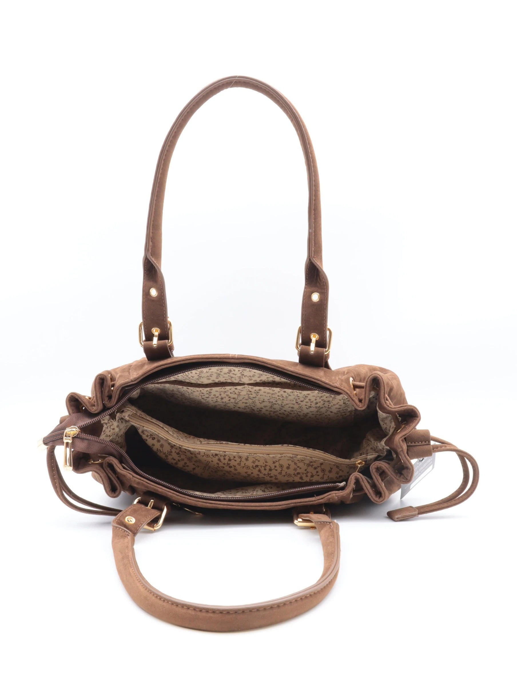 Cuir tanné marron, sac à main avec poches et doublure florale.